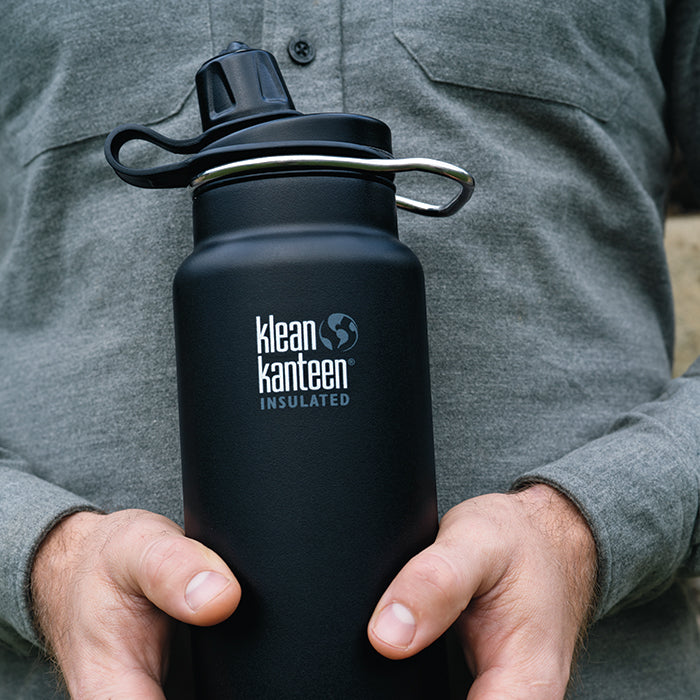 tkwide-chug-cap-q0 K32TKWSSL-SB-Craddled-Bottle_closeup_lifestyle.jpg