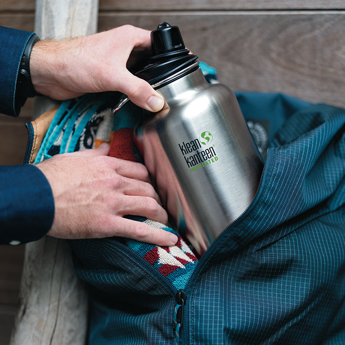 tkwide-chug-cap-q0 K64TKWSSL-BS-Chug-Cap-Out-of-Duffle_lifestyle.jpg