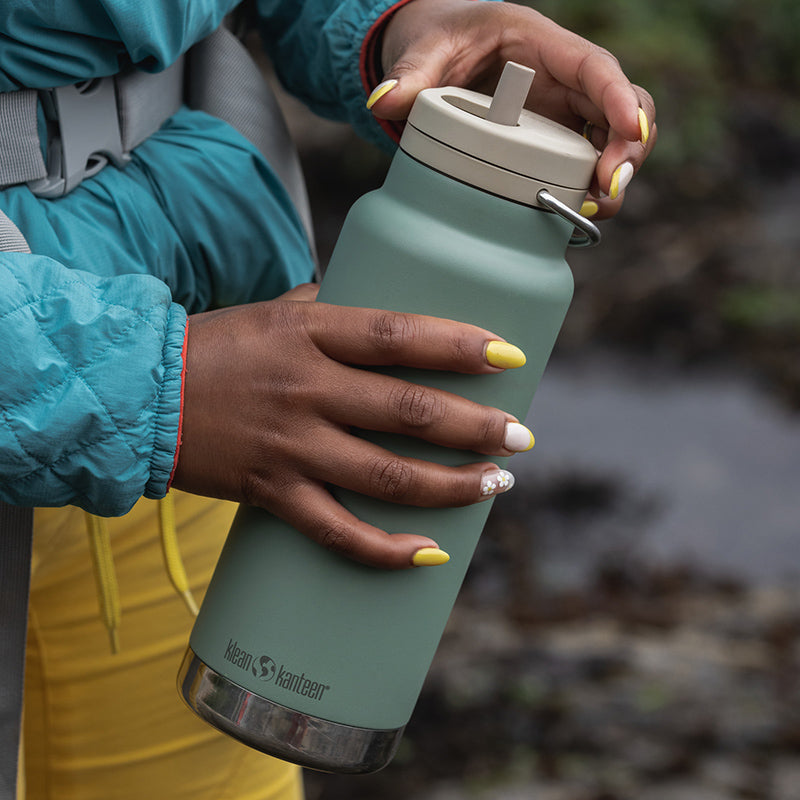 32oz-tkwide-made-to-do-more-bundle-y0 tkwide_32oz_insulated_bottle_twist_closeup_seapsray_hand_square.jpg