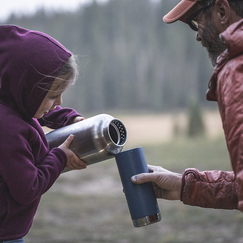 64oz-tkwide-with-loop-cap-i4 tkwide_64oz_bottle_girl_dad_filling_square.jpg
